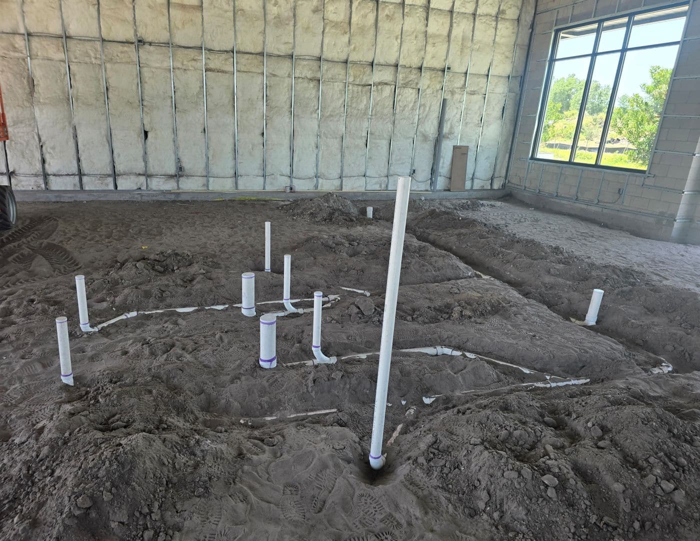 Underground drain-waste-vent piping laid for a new slab